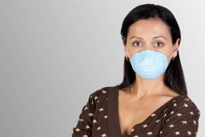 woman with allergies in mask